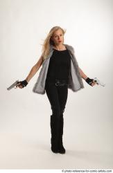 NIKOL ACTION STANDING POSE WITH GUNS